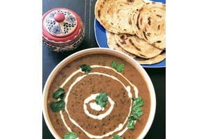 Dal Makhani con Jeera Rice o Naan (3 pc) de Samosa Corner en Ciudad de México